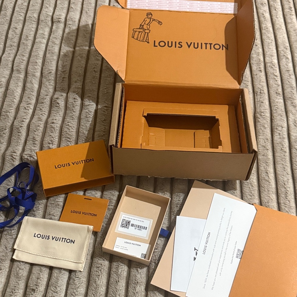 Louis Vuitton Orange and Cream Packaging Collection